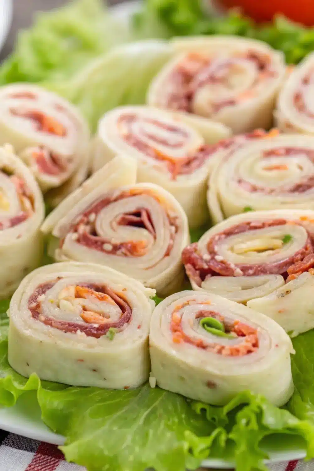 Flavorful Italian sub pinwheels packed with meats, cheeses, and tangy dressing.