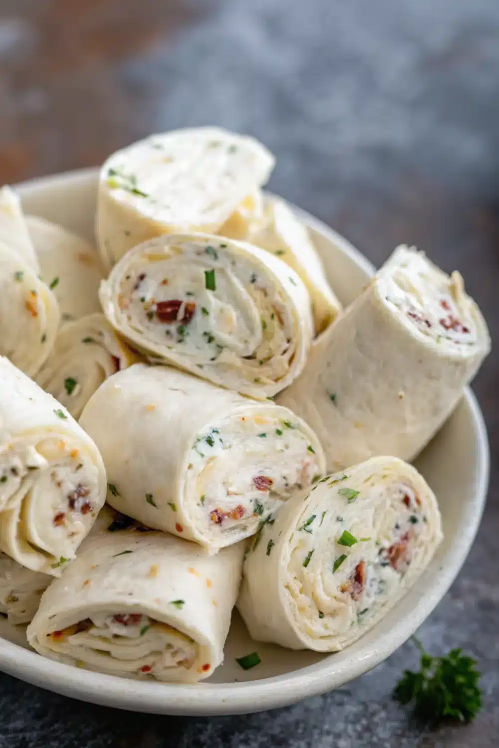 Delicious turkey bacon ranch pinwheels showcasing layers of savory turkey and crispy bacon.