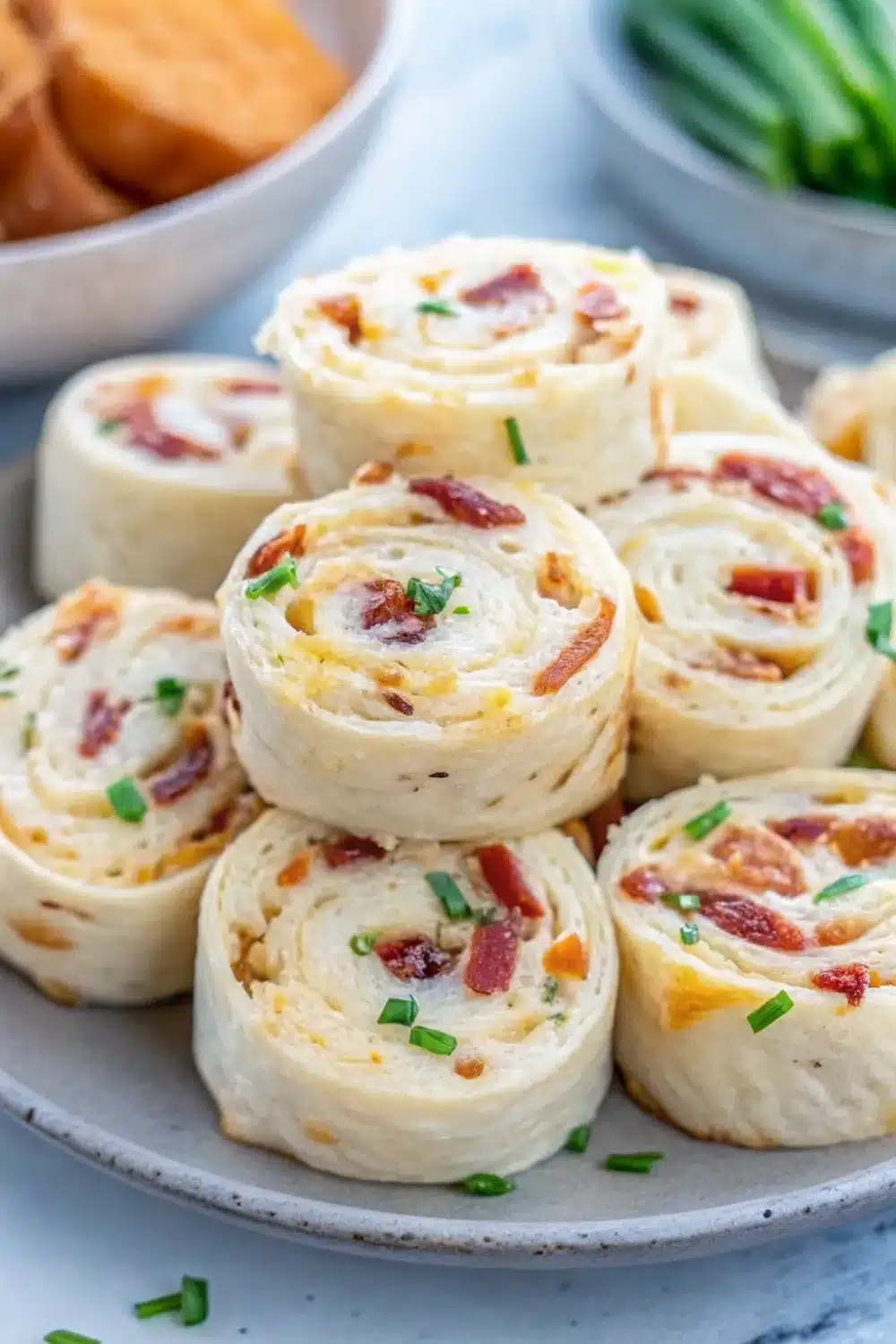 Layered beef bacon cheddar ranch pinwheels bursting with flavor.